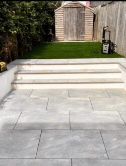 Low-maintenance artificial grass lawn installed as part of full garden design in Rickmansworth